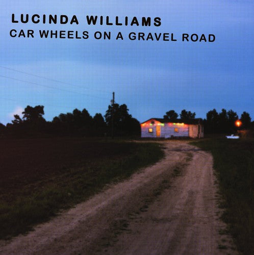 Car Wheels On A Gravel Road